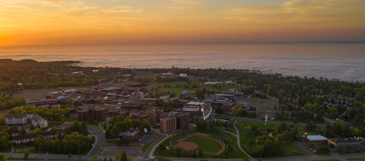Aerial View of UMD Campus overlooking Lake Superior at sunrise